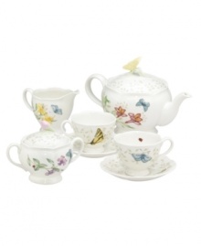 Turn your tabletop into a sun-soaked butterfly haven! From the breakfast table to your dinner party, this gently scalloped tea set will brighten your meal with a yellow and blue butterfly pattern fluttering above vibrant florals. Qualifies for Rebate