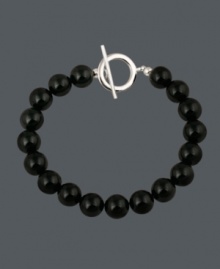 Bold style with a flair for the dramatic. Avalonia Road bracelet features round onyx beads (10 mm) with a sterling silver toggle clasp. Looks perfect when worn solo, or paired with other stackable bracelets. Approximate length: 7-1/2 inches.