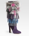 For a statement-making look, this fringed suede boot with multicolored genuine fox fur is the perfect choice. Self-covered heel, 4¾ (120mm)Hidden platform, ½ (15mm)Compares to a 4¼ heel (110mm)Shaft, 15Leg circumference, 13Suede upper with dyed fox furPull-on styleLeather lining and solePadded insoleMade in Italy