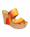 Stunning straps. Nine West's Larysa platform wedge sandals slide on comfortably and are super stylish too.