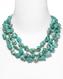 Lauren Ralph Lauren pays homage to Southwestern style with this chunky three-strand beaded necklace, accented by an evocative mix of silver and turquoise beads.