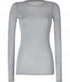 Ground your cool weather casual wardrobe with stylish staples like this grey long sleeve tee from Closed - Crafted from a super-soft, semi-sheer modal, cashmere and silk blend - Long, lean cut, hits below hips - Fitted sleeves and flattering round neck - Wear solo or layer with a blazer or pullover and pair with cigarette pants, jeans or A-line skirts