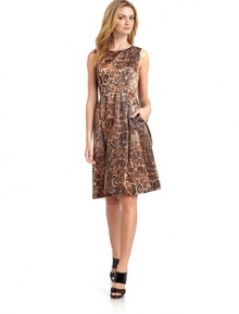 THE LOOKAllover leopard printPleated A-line skirtBack zip with hook-and-eye closureVented back hemTHE FITAbout 38 from shoulder to hemTHE MATERIALCotton/polyacrylic/polyesterFully linedCARE & ORIGINDry cleanImportedModel shown is 5'9½ (176cm) wearing US size 4. 