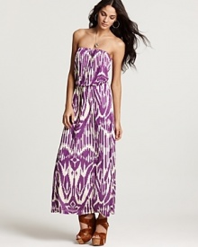 A vibrant ikat print imbues this Velvet by Graham & Spencer strapless dress with bohemian charm.