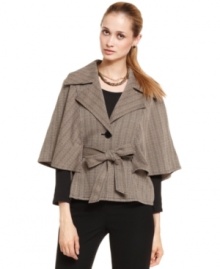 Instead your everyday blazer routine, why not try out Nine West's herringbone cape? Balance out the fluid silhouette with tailored pencil skirts.