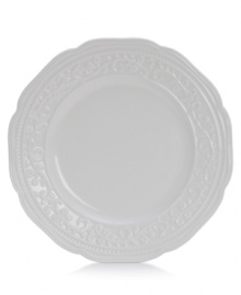 A little bit country. Made for the rigors of daily use but with an embossed design that's entirely graceful, the American Countryside salad plate from Mikasa promises well-balanced dining in classic white stoneware.