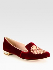 Embroidered velvet design with metallic leather trim and a slight heel with jewel detail. Velvet upper with metallic leather trimLeather lining and solePadded insoleMade in ItalyOUR FIT MODEL RECOMMENDS ordering one half size up as this style runs small. 