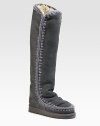 Natural and feminine, this suede outdoor-style has crochet wool seams and soft sheepskin lining for extra warmth.Shaft, 14½ Leg circumference, 15 Round toe Pull-on style Padded insole EVA & rubber outdoor sole Imported Fur origin: Australia OUR FIT MODEL RECOMMENDS ordering true whole size; ½ sizes should order the next whole size up. 