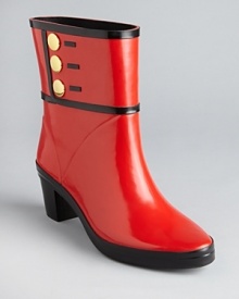 Rainy days are no match for these vibrant kate spade new york rain boots; military inspired buttons and contrast edging add extra dash.