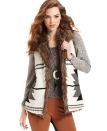 Bar III's cozy vest features faux-fur trim and a graphic pattern for a fashion-forward look with a rugged edge.