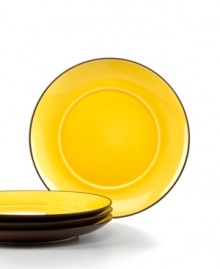 Incredible inside and out. Waechtersbach Duo salad plates partner durable porcelain with a two-tone glaze that's sunny and bright on one side, matte chocolate on the reverse.