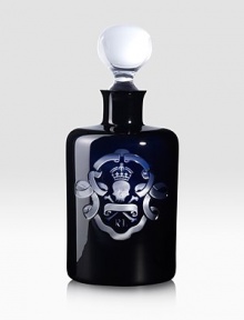 This exquisite piece is crafted from hand-blown clear crystal, cased in black crystal with a whimsical hand-cut skull-and-crossbones motif.40 ounces11½L X 11HHand washImported