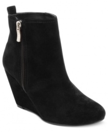 Let the sultry suede upper of BCBGeneration's Weslee platform wedge booties set the scene for your glamorous days.