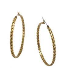 Tie up all the loose ends in this stylish rope design by BCBGeneration. A chic, twisted design shines in rich antique gold tone mixed metal. Approximate diameter: 1-1/2 inches.