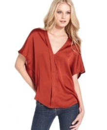 In a stylishly slouchy shape, this slinky satin Kensie blouse is perfect for dressing up denim!