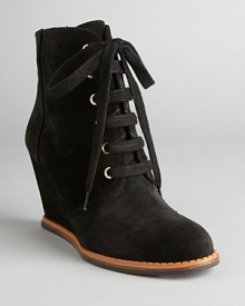 These booties wedge multiple trends into one tied-together style, with lace up vamps and athletic influences; from kate spade new york.