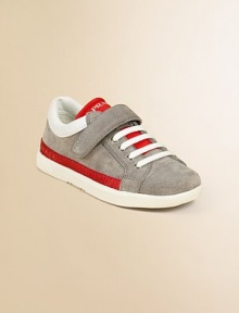 Lace-up sport sneaker with contrast trim and perforated leather.Leather upperGrip-tape closureRubber soleImported