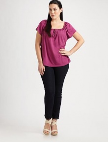 You are destined to find this ultra-soft supima cotton and micro modal top irresistible. This feminine top features a self-tie neckline with flattering gathered details.Self-tie gathered necklineShort sleevesCurved hemPull-on styleAbout 25 from shoulder to hem50% supima cotton/50% micro modalMachine washMade in USA