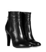 With their sleek stretch nappa and streamlined patterning, Laurence Dacades black lambskin ankle boots are as versatile as they are chic - Round toe, exposed metal back zip, covered leather heel - Hits just above the ankle - Wear with everything from tights and skirts to skinny jeans and pullovers