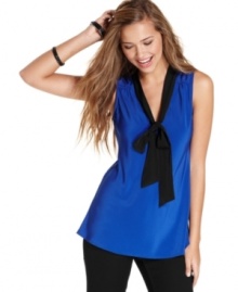 Potent cobalt hue makes this bow blouse from BCX a total eye-catcher! Pair the top with statement-making jewelry for a look that takes advantage of the season's love of all things bold!