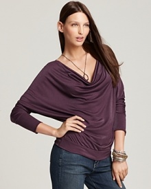 With a relaxed silhouette and of-the-moment dolman sleeves, this draped neck top from Laila Jayde channels everyday elegance.