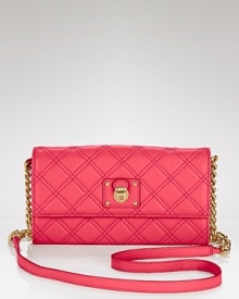 Marc Jacobs' chic quilted leather wallet boasts great versatility with a detachable crossbody strap.