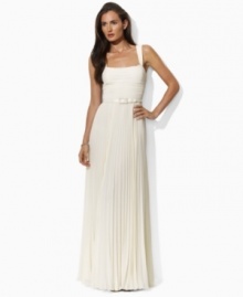 A dramatic floor-skimming gown in elegant pleated georgette is beautifully accented with a lustrous satin belt complete with a glittering rhinestone buckle in this Lauren by Ralph Lauren look. (Clearance)