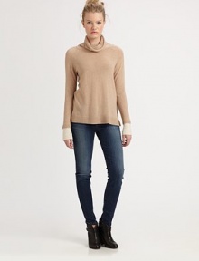 Luxe knit cashmere in a lightweight pullover styled with a soft, shapely cowlneck.CowlneckRaglan sleevesPullover styleRibbed trimCashmereHand washImportedModel shown is 5'10 (177cm) wearing US size Small.