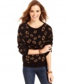 Reconnect with your fierce side! Cotton Emporium's super-cozy sweater features metallic threading and fun animal spots.