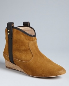 Amble along in these Western-influenced Matt Bernson booties, that stand apart from the pack with contrast tab sides highlighted by post hardware.