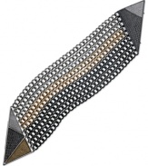 Painted color adds an artistic quality to this industrious bracelet from GUESS. The silver tone nine-row design features hematite and gold tone accents. Finished with a magnetic closure. Crafted in silver tone mixed metal. Approximate length: 7-1/2 inches.