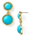 Build your look around bold baubles like this pair of gold-rimmed earrings from Kenneth Jay Lane, boasting coolly hued cabachons and a vintage-inspired shape.