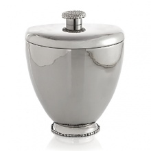 Marked by incredible handcrafting, this ice bucket is embellished with countless molten beads carefully placed by a highly skilled artisan. The look is streamlined, timeless, organic and soulful.