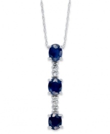 Elegance in the shape of a Y. This stunning pendant features three, oval-cut sapphires (1-3/8 ct. t.w.) with rows of diamond accents in between. Set in 14k white gold. Approximate length 16 inches. Approximate drop: 1 inch.