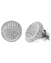 Stylish in silver tones. This pair of concave stud earrings from Michael Kors, crafted from silver ion-plated steel, simply dazzles with glass pave accents. Approximate diameter: 1/2 inch.