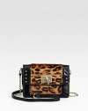 This miniature design combines smooth leather with leopard-print calf hair and gleaming hardware for a luxurious effect. Detachable chain and leather shoulder strap, 22½ dropFlap closure with turn-lockOne inside zip pocketOne inside open pocketEight credit card slotsCotton lining7¾W X 5H X 1DImported