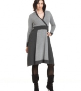 Stay warm and stylish this season with Alfani's plus size sweater dress, highlighted by a colorblocked pattern.