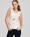 A bohemian beauty from Aqua--this crocheted crop top exudes feminine sophistication in its finest form.