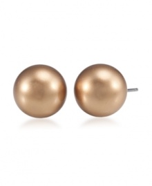 Nothing says class like a pair of smooth studs by Carolee. Earrings feature gold glass pearls (10mm) crafted in gold-plated mixed metal.