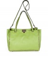 Radiate Valentinos covetable-chic look with this bright apple green rockstud adorned tote - Embossed logo, double top handles, removable shoulder strap, platinum-toned rockstud trim and hardware, hinged top closure inside zippered back wall pocket, two front wall slot pockets, protective feet - Carry as an immaculate polish to bright print dresses or elevated jeans-and-tee ensembles