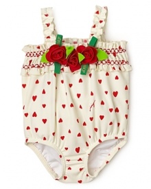 A bounty of sweet bows, roses and hearts sweeten this adorable infant Juicy Couture swim suit.