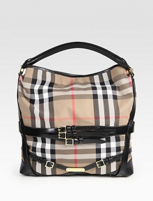 A perfect slouchy shape for all of your essential items, crafted in the classic canvas Burberry check with sleek leather trim. Leather top handle, 3 dropDetachable leather shoulder strap, 9½ dropOne inside zip compartmentOne inside zip pocketCotton lining10W X 12H X 5DMade in Italy