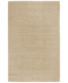 By using a centuries-old technique, craftsmen are able to produce the unique detail and texture of this plush wool rug from Surya's Mystique collection. They work traditional shuttles, then hand-carve and hand-finish the rug in pursuit of high quality and a flawless finish. Carved discs and spirals add subtle style to this elegant, versatile rug.