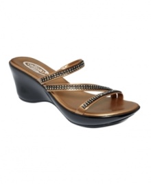 Embrace the sparkle. Neat rhinestone rows adorn these darling Starlite wedge sandals by Callisto.