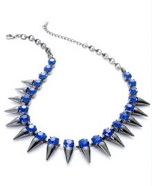 Look sharp with this necklace from Bar III. Crafted from hematite-tone mixed metal, the necklace is adorned with spikes and blue glass crystals for a bit of fashion on the edge. Approximate length: 16 inches + 2-inch extender.