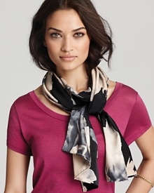 You'll reach for this elegant Charlotte Sparre scarf again and again, with a subtle yet striking peony print. It's the perfect way to break up basic black.