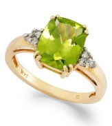 Take your look to the next level with the right amount of color. A rectangular-cut peridot (3-1/4 ct. t.w.) and a crowns of diamond accents add sparkle to this shining 14k gold ring.