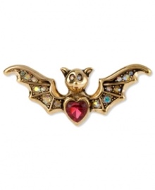 Take a bite out of the night with this chic stretch ring from Betsey Johnson. The bat wing design is adorned with crystal accents, a pink crystal heart and a gold tone segmented body. Stretches to fit finger. Crafted in antiqued gold tone mixed metal. Size 7-1/2.