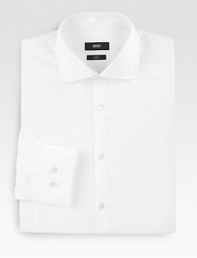 A crisp, slim-fitting classic tailored in fine cotton. ButtonfrontSpread collarCottonDry cleanImported