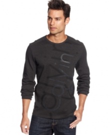 Add sleek style to your casual look with this Calvin Klein long sleeve graphic tee.